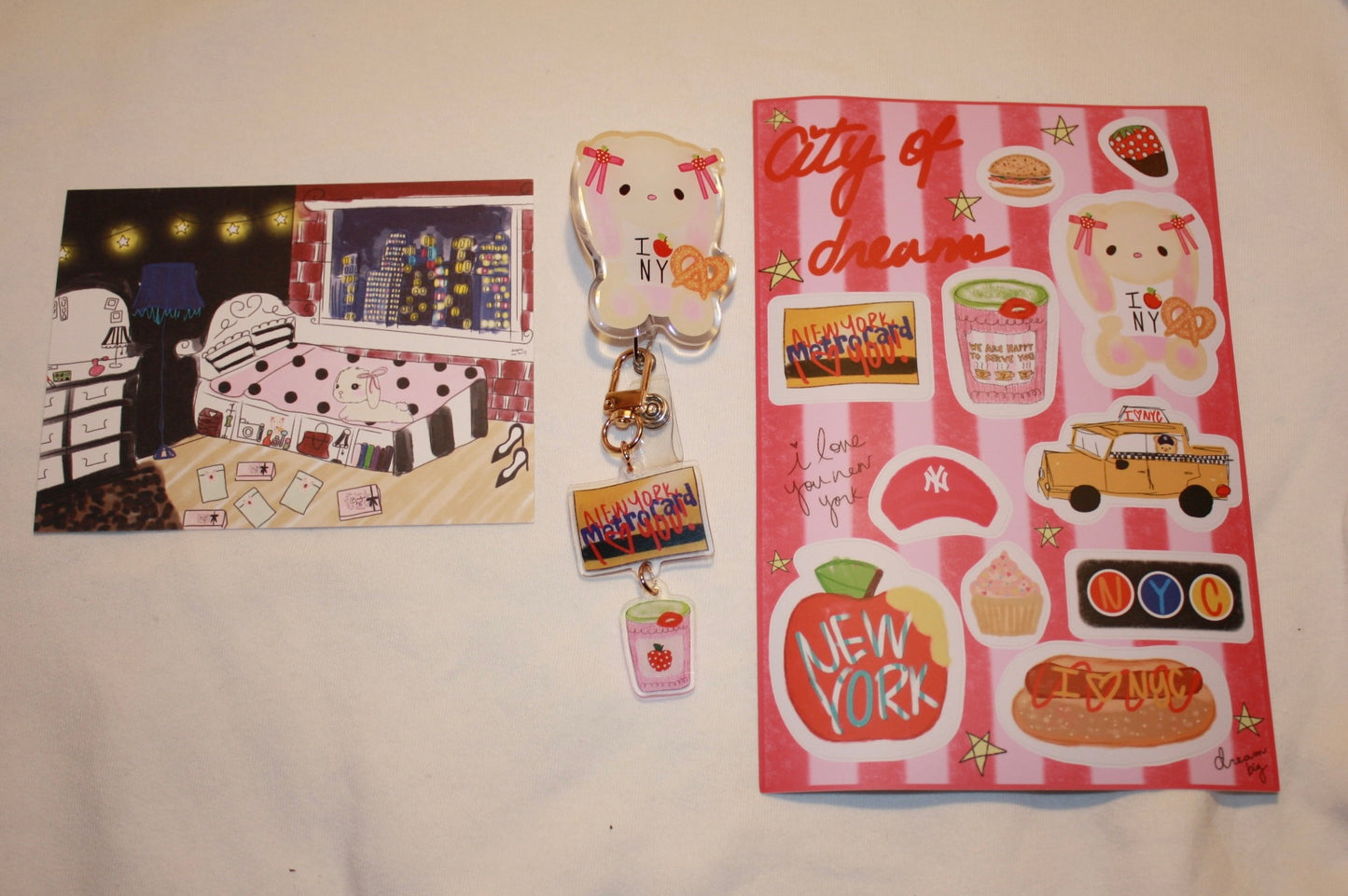 I 🍎 NY Bunny🥨 Badge Reel with sticker sheet 🌃👠📷🚕❤️