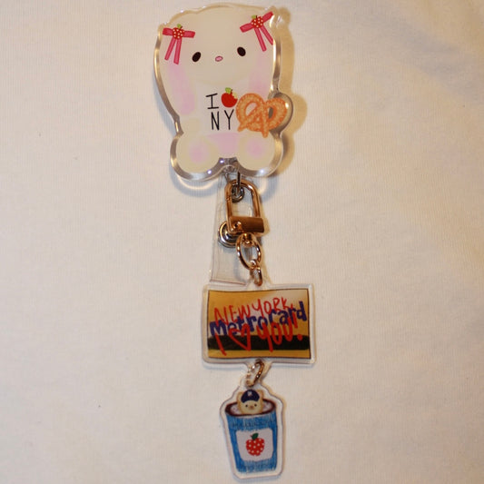 I 🍎 NY Bunny🥨 Badge Reel with sticker sheet 🌃👠📷🚕❤️