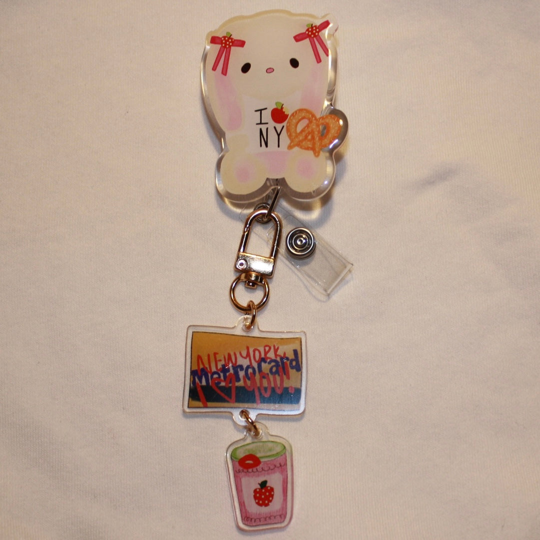 I 🍎 NY Bunny🥨 Badge Reel with sticker sheet 🌃👠📷🚕❤️
